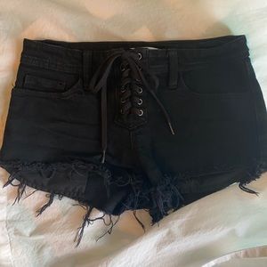Eunina Black Denim Low Rise Pixie Shorts. Size XS.